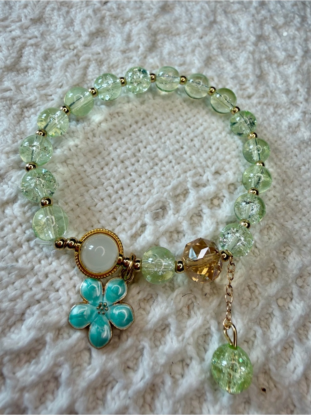 Green Crackle Glass Bead Bracelet with Blue Flower Charm